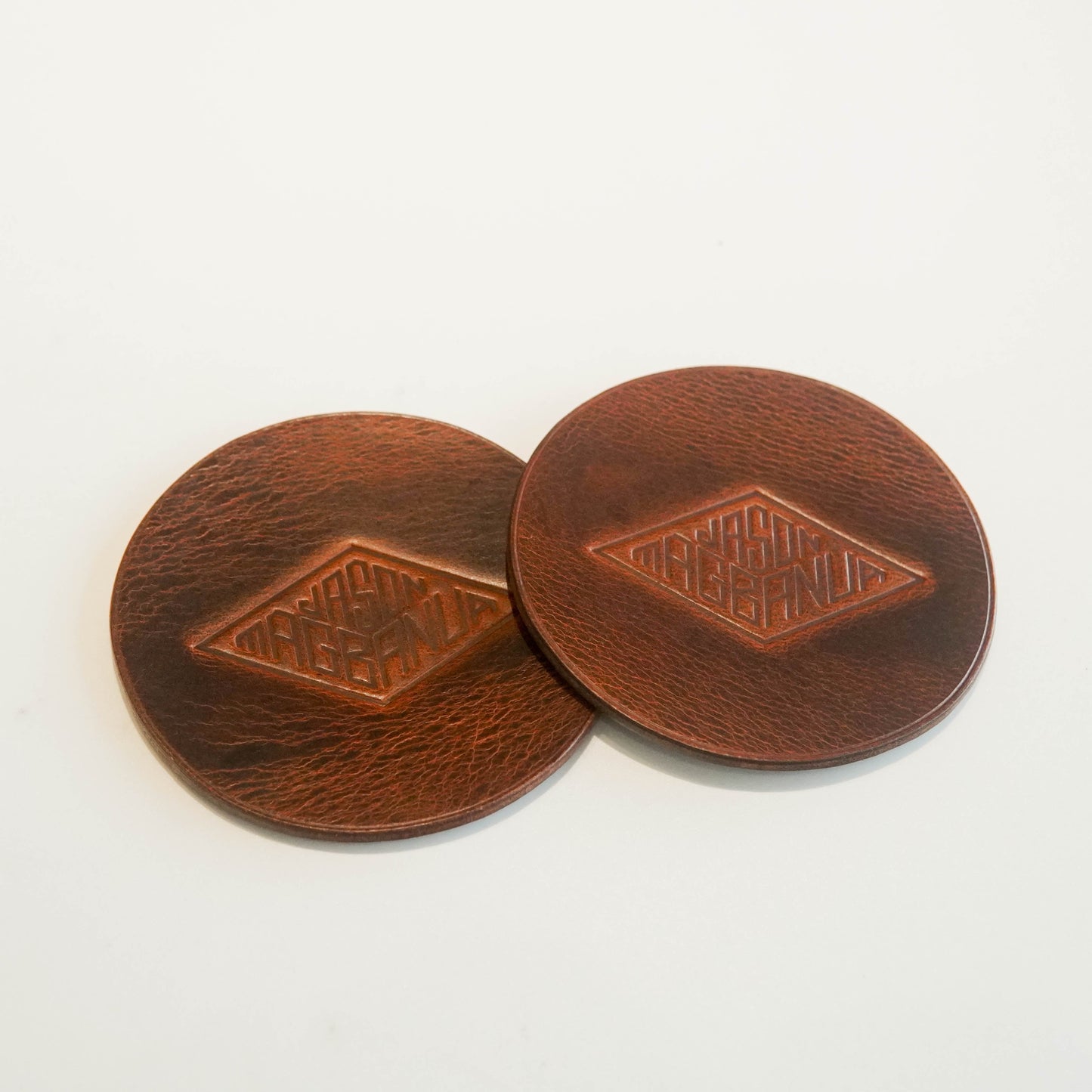 SDE Leather Coaster by Jason Magbanua