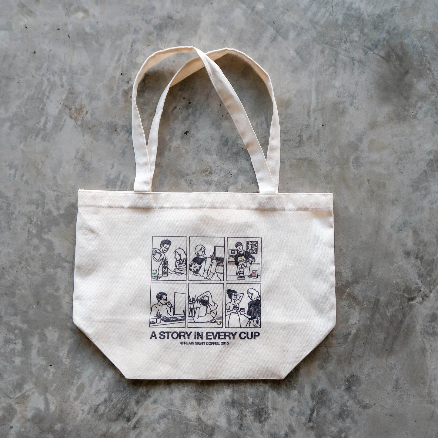 The Plain Sight Story Tote from the front, laid flat