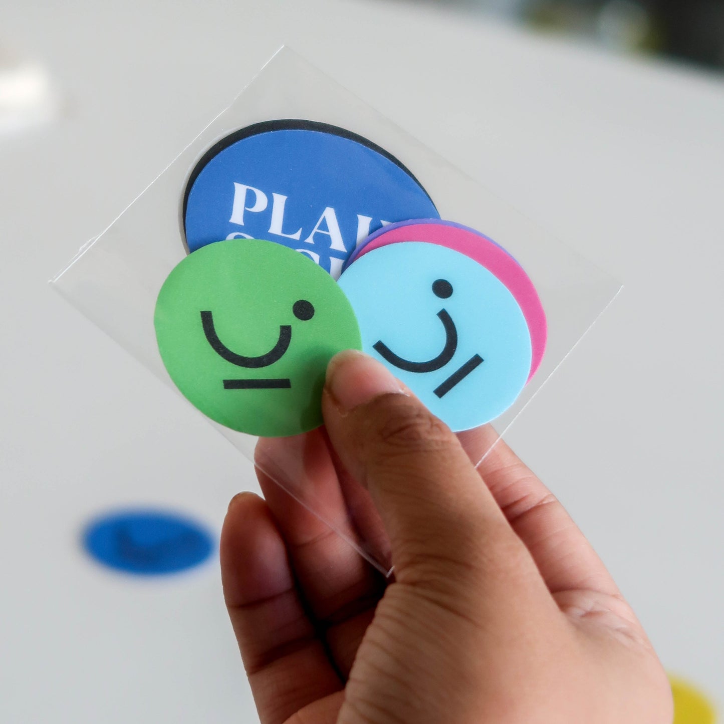 Plain Sight's logo sticker pack, packed