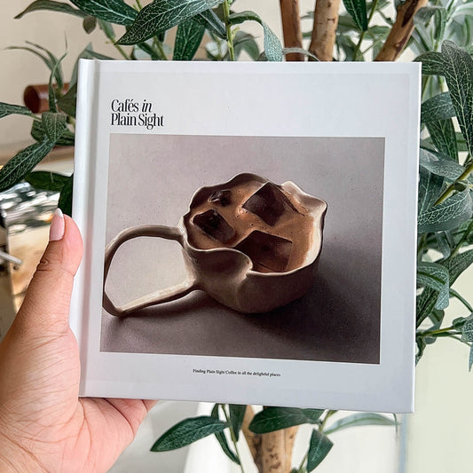 Cafés in Plain Sight Coffee Table Book by Den Ocampo